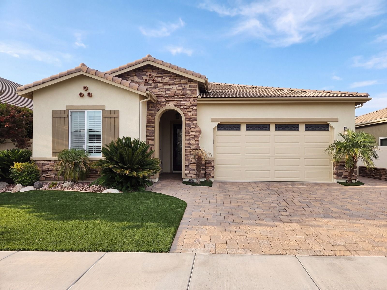 Sunlit Ivory palette, digital rendering: ivory stucco, taupe shutters, a cream garage door