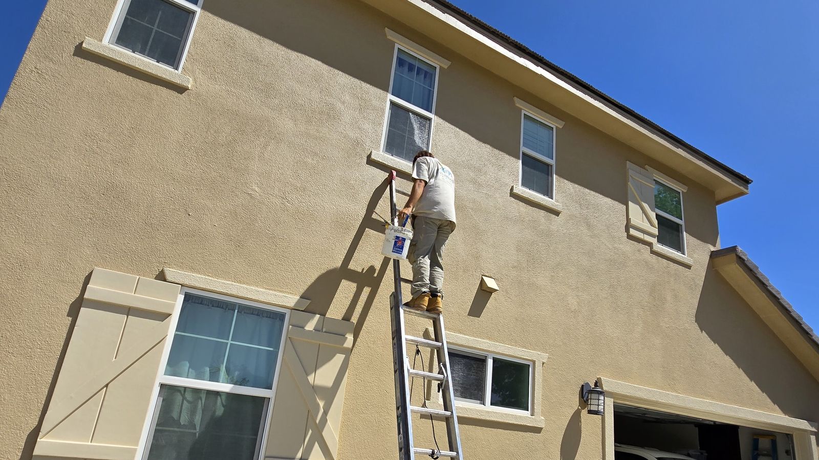 Crew patching and texturing stucco
